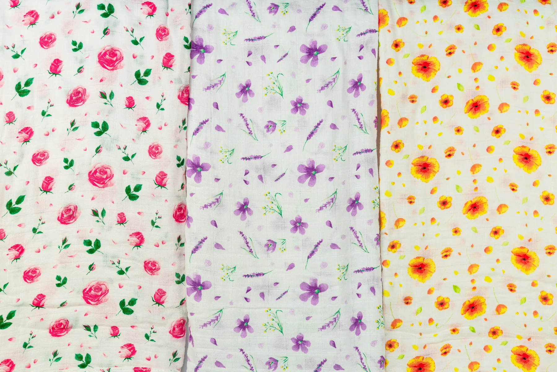 Close-up of floral Mama Cookie bamboo muslin swaddle patterns